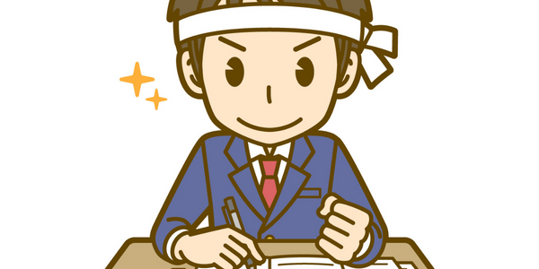 はちまきを巻いて勉強する男子高校生